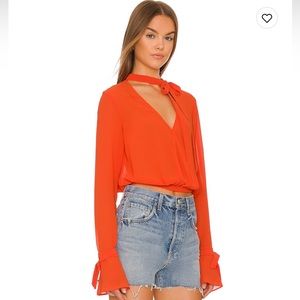 Orange long sleeve blouse; worn once